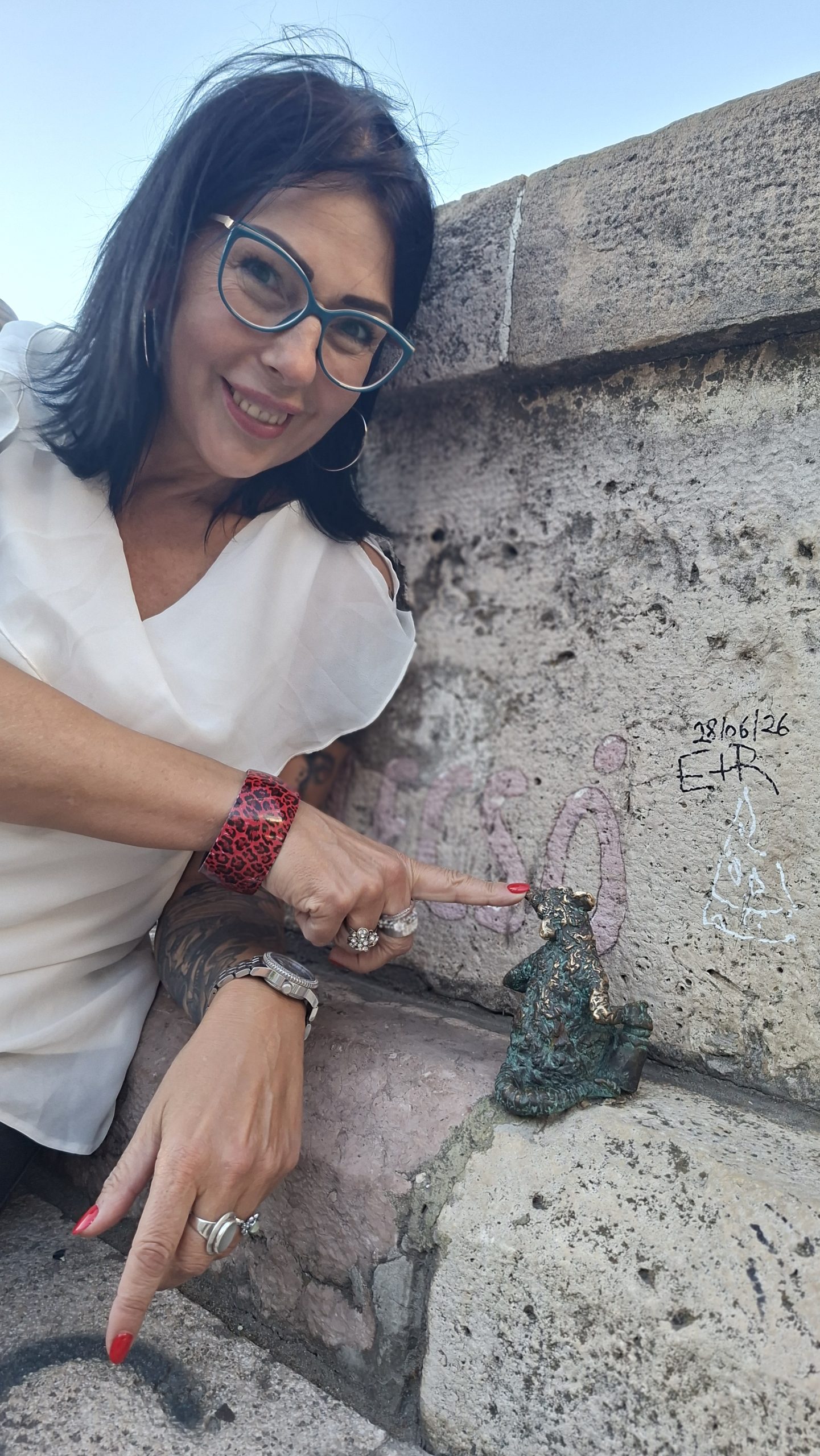 Mary Carry showing a Kolodko mini sculpture